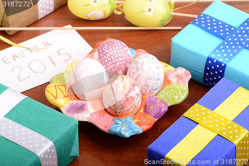 Image of Easter background with eggs and gift box
