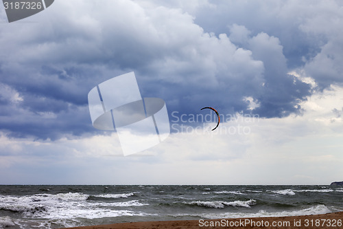 Image of Power kite in sea and cloudy sky