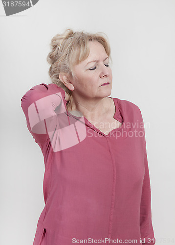 Image of elderly woman with neck pain