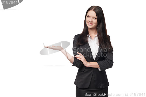 Image of Business woman showing open hand palm