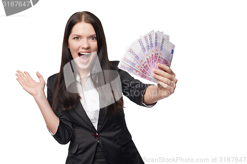 Image of Excited woman with euro money in hand