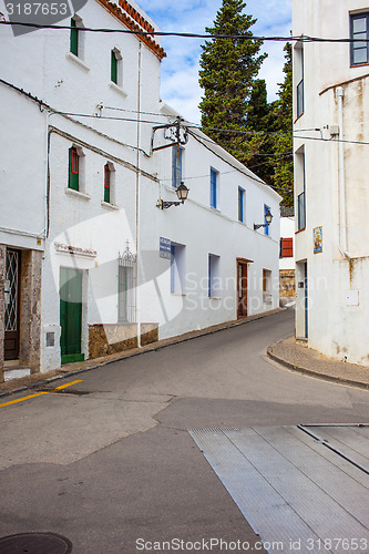 Image of Tossa de Mar, Spain, Carrer la Guardia street at summer day