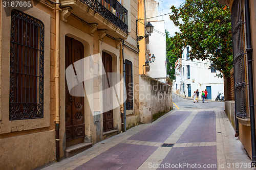 Image of Tossa de Mar, Spain, Carrer la Guardia street at summer day