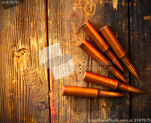 Image of five rifle cartridges