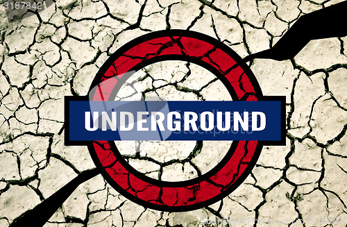 Image of The cracks texture with undeground sign