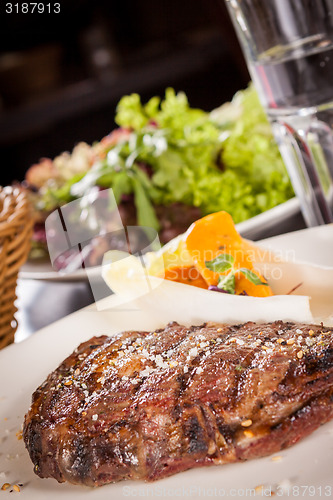 Image of Grilled beef steak with seasoning