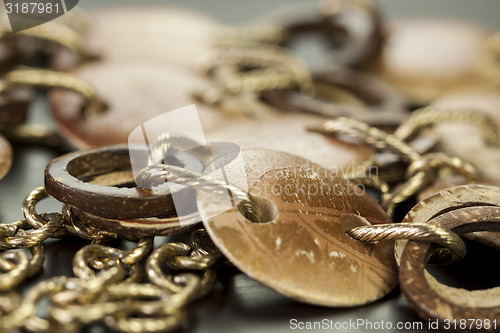 Image of Scratched and tarnished old silver jewellery