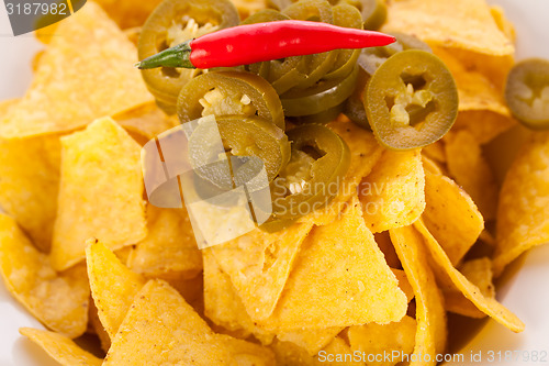 Image of Nachos with cheese sauce and chilli pepperoni