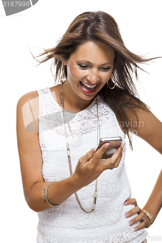 Image of Vivacious woman reacting to a text message