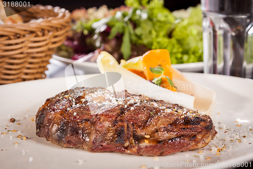 Image of Grilled beef steak with seasoning