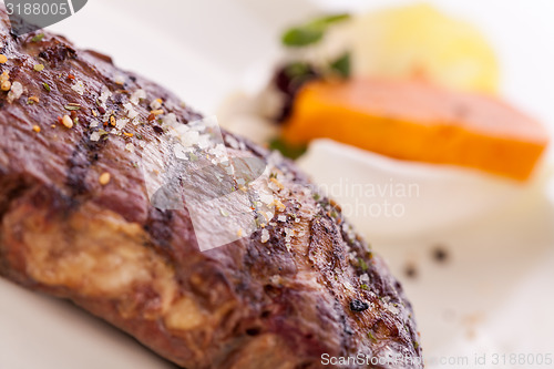 Image of Grilled beef steak with seasoning