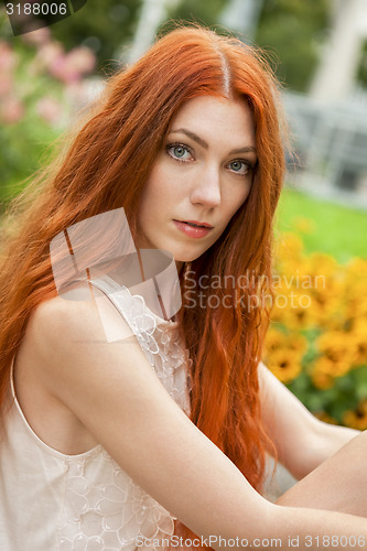 Image of Gorgeous Blond Woman Looking at Camera