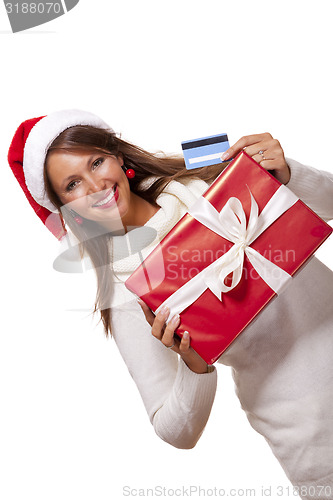 Image of Woman holding a Christmas gift and bank card