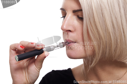 Image of Close up Blond Woman Smoking Using E- Cigarette