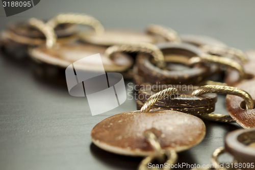 Image of Scratched and tarnished old silver jewellery