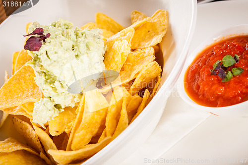 Image of Crisp corn nachos with guacamole sauce