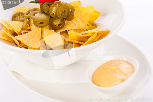 Image of Nachos with cheese sauce and chilli pepperoni