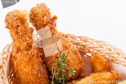 Image of Crisp crunchy golden chicken legs and wings