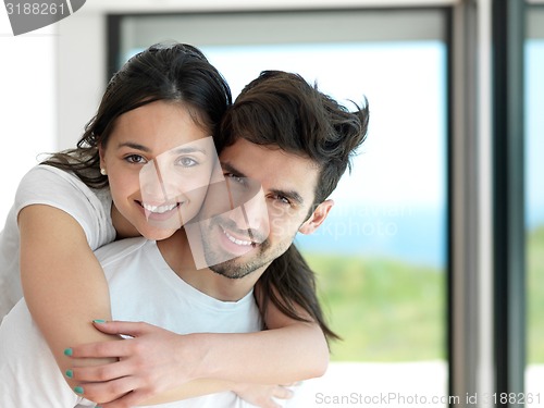 Image of relaxed young couple at home