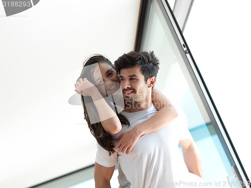 Image of relaxed young couple at home