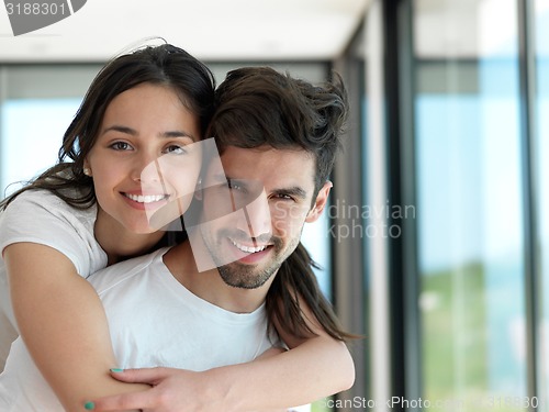 Image of relaxed young couple at home