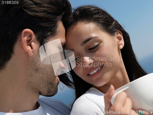 Image of happy young romantic couple have fun arelax  relax at home