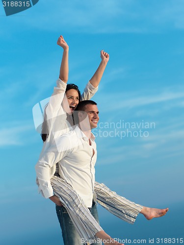 Image of happy young romantic couple have fun arelax  relax at home