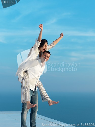 Image of happy young romantic couple have fun arelax  relax at home