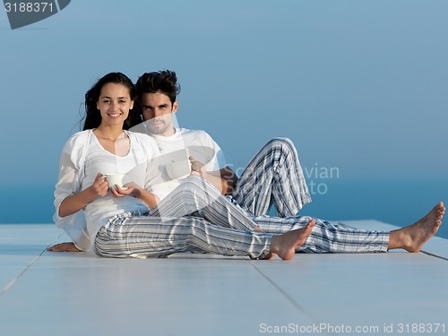 Image of relaxed young couple at home
