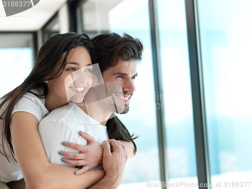 Image of relaxed young couple at home