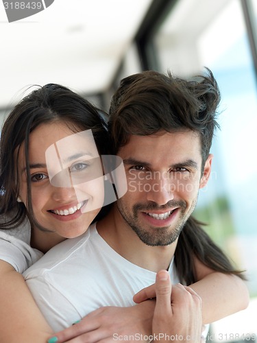 Image of relaxed young couple at home
