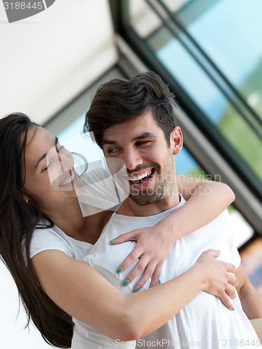 Image of relaxed young couple at home