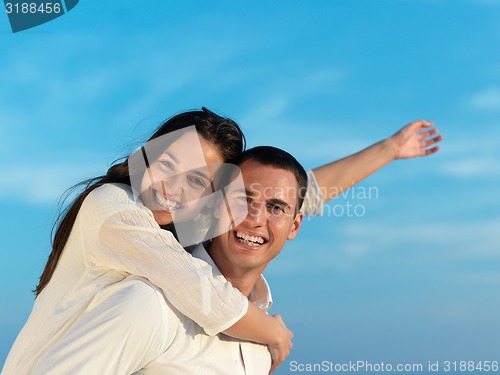 Image of happy young romantic couple have fun arelax  relax at home