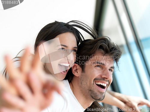 Image of relaxed young couple at home