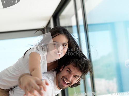 Image of relaxed young couple at home