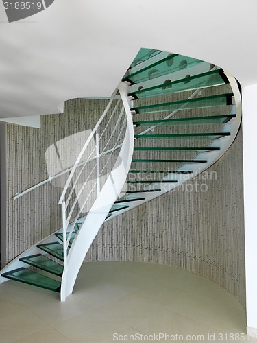 Image of modern glass spiral staircase