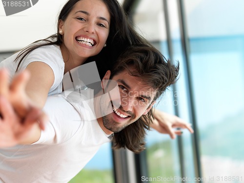 Image of relaxed young couple at home