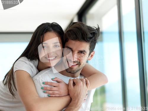 Image of relaxed young couple at home