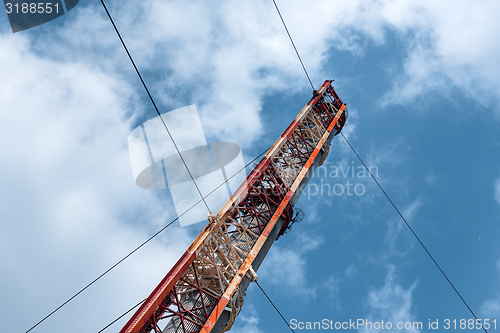 Image of Large transmission towers at sunset