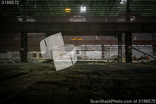 Image of Industrial interior with bulldozer inside