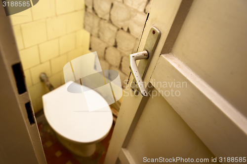 Image of Used abandoned toilette in grungy room