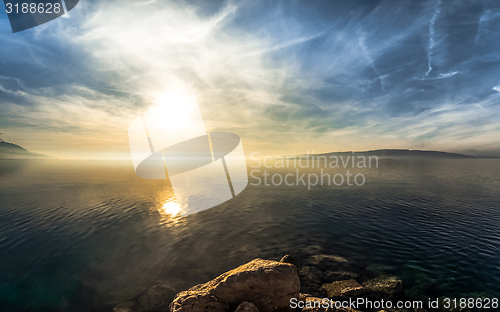 Image of Beach with rocks and a cloudy sky