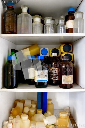 Image of Old laboratory with a lot of bottles