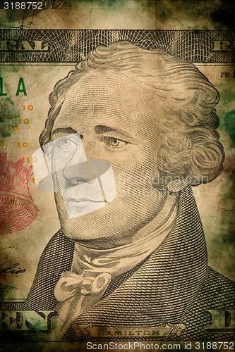 Image of Macro of Alexander Hamilton on ten USA dollar banknote grunge vintage style