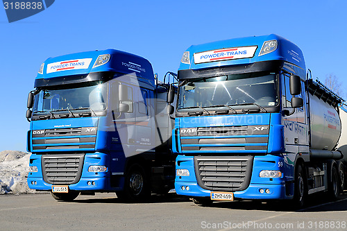 Image of Two Blue DAF XF 105 Trucks