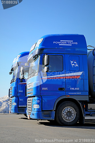 Image of Two Blue DAF XF 105 Trucks