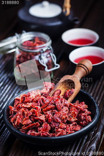 Image of Dry tea on wooden table