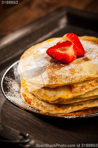 Image of Crepes with fresh strawberries