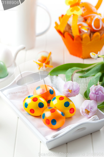 Image of Easter eggs with spring flowers