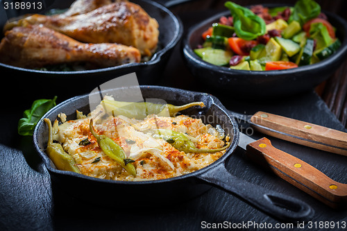 Image of Baked feta cheese with avocado salad